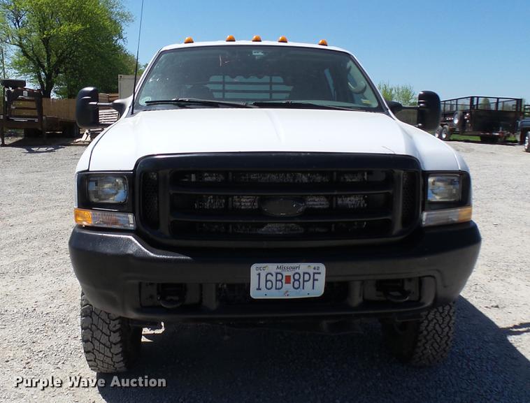 image for item CC9169 2003 Ford F350 Super Duty XL Crew Cab flatbed pickup truck