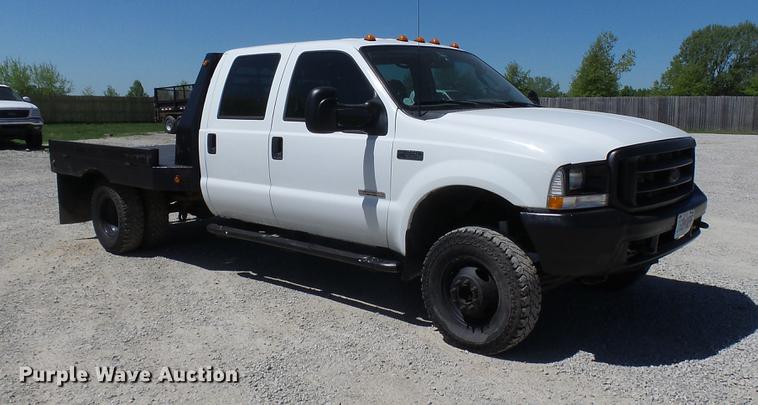 image for item CC9169 2003 Ford F350 Super Duty XL Crew Cab flatbed pickup truck