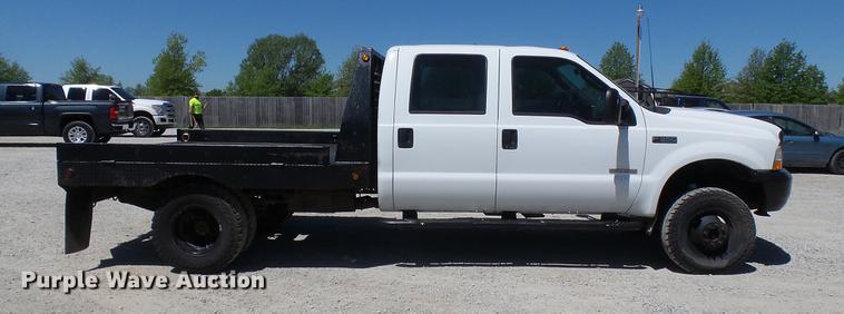 image for item CC9169 2003 Ford F350 Super Duty XL Crew Cab flatbed pickup truck