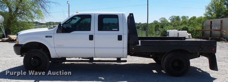 image for item CC9169 2003 Ford F350 Super Duty XL Crew Cab flatbed pickup truck