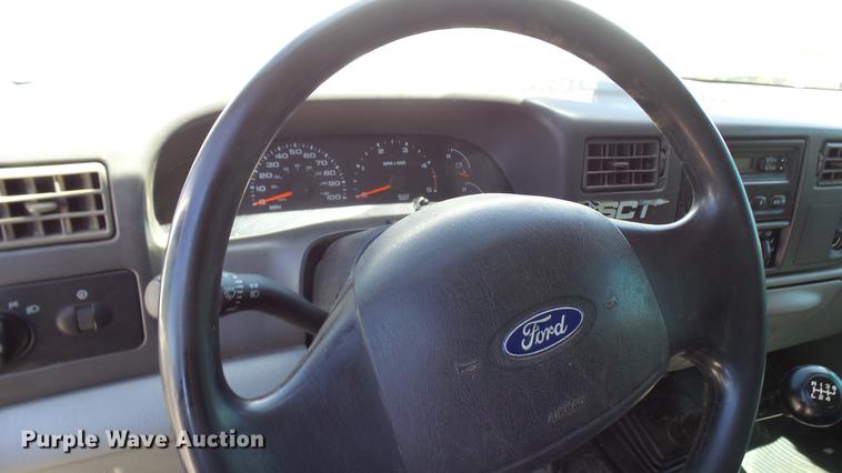 image for item CC9169 2003 Ford F350 Super Duty XL Crew Cab flatbed pickup truck