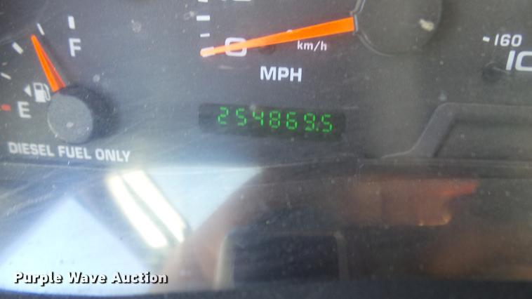 image for item CC9169 2003 Ford F350 Super Duty XL Crew Cab flatbed pickup truck