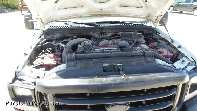 image for item CC9169 2003 Ford F350 Super Duty XL Crew Cab flatbed pickup truck