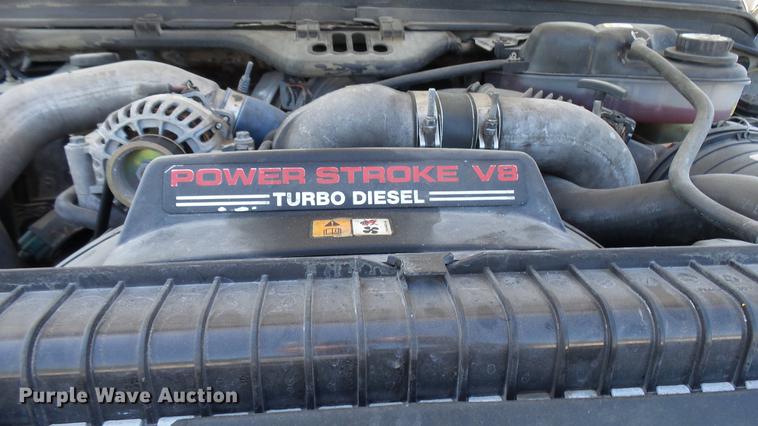 image for item CC9169 2003 Ford F350 Super Duty XL Crew Cab flatbed pickup truck