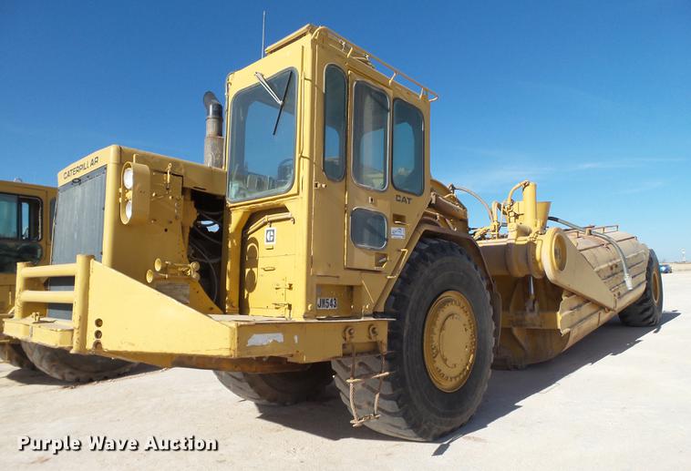 image for item DD1209 1989 Caterpillar 631E water wagon