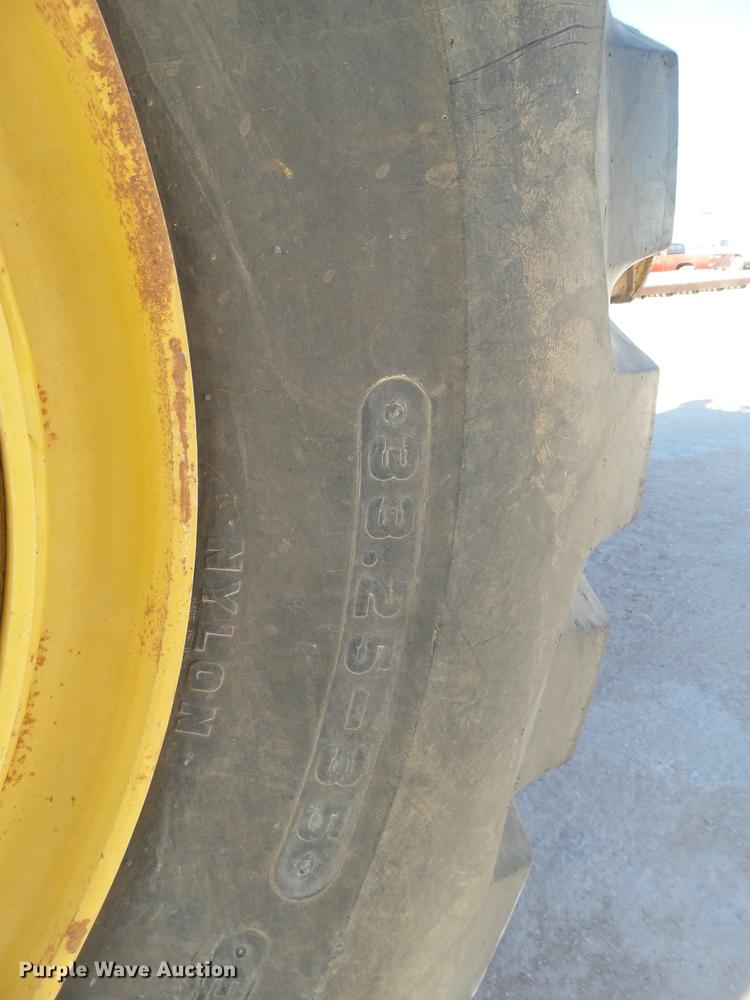 image for item DD1209 1989 Caterpillar 631E water wagon