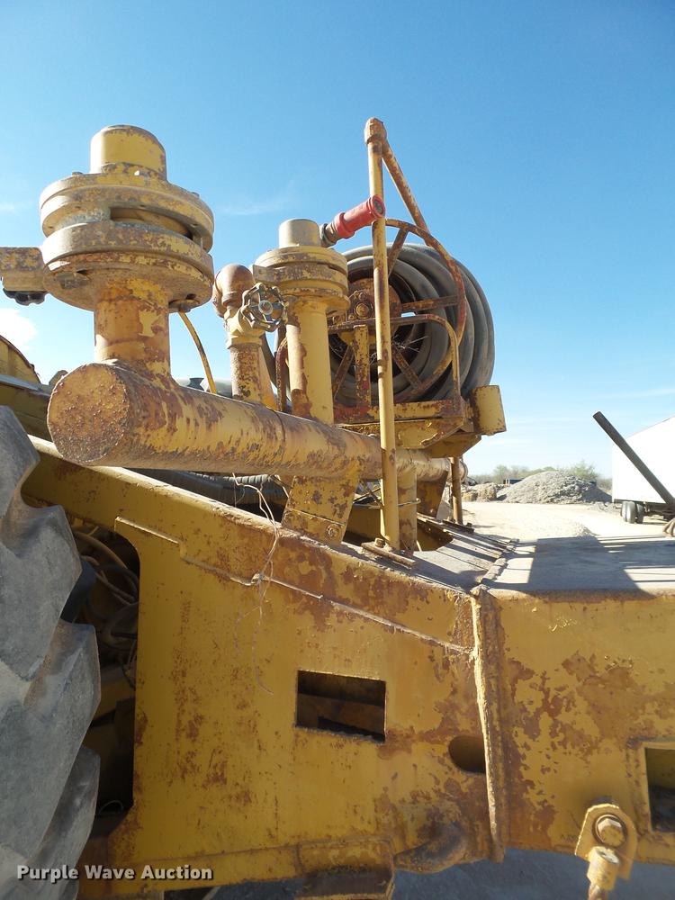 image for item DD1209 1989 Caterpillar 631E water wagon