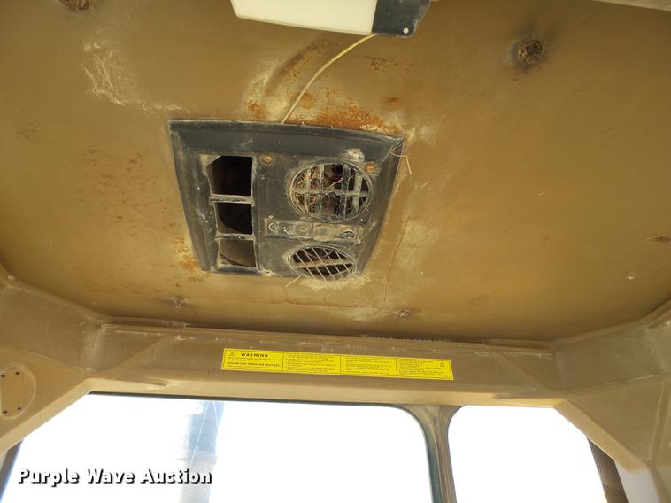 image for item DD1209 1989 Caterpillar 631E water wagon