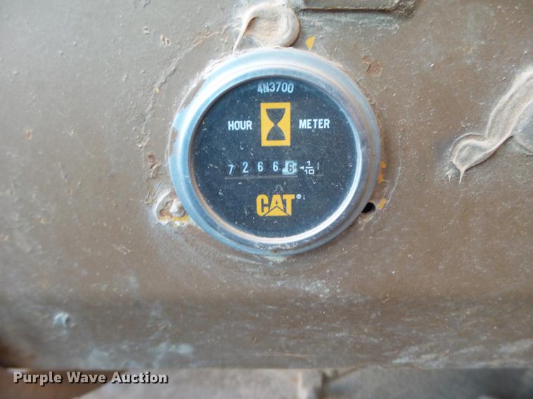 image for item DD1209 1989 Caterpillar 631E water wagon