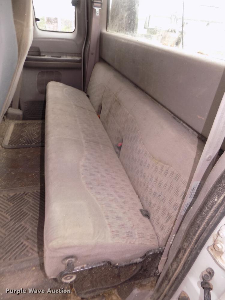 image for item DD2770 1999 Ford F350 Super Duty XLT SuperCab flatbed pickup truck