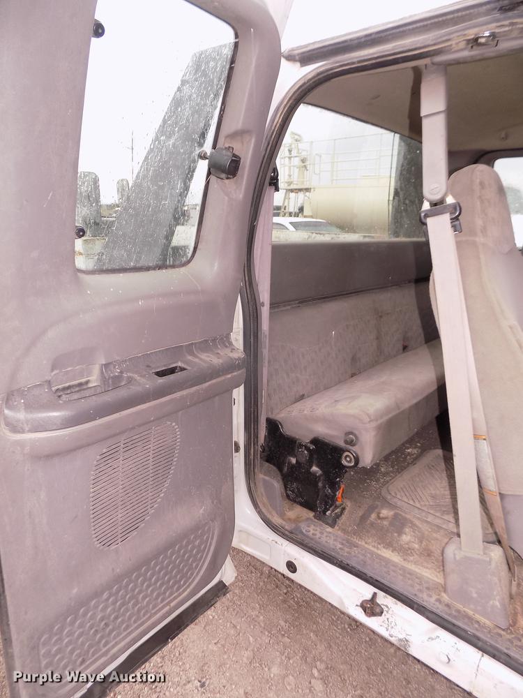 image for item DD2770 1999 Ford F350 Super Duty XLT SuperCab flatbed pickup truck