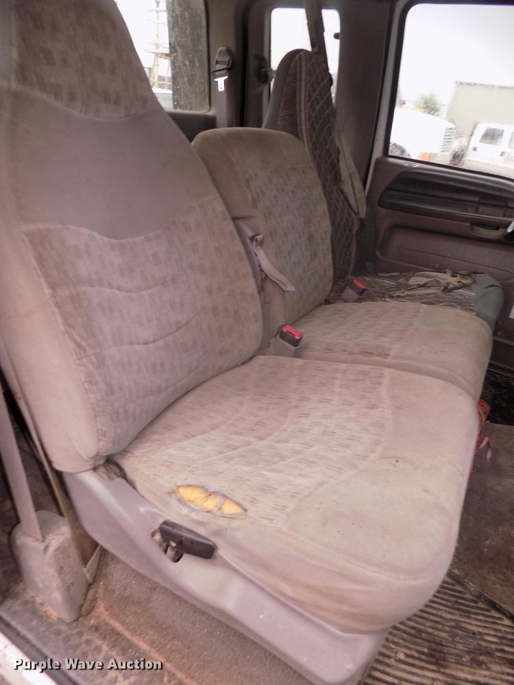 image for item DD2770 1999 Ford F350 Super Duty XLT SuperCab flatbed pickup truck