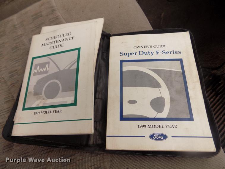 image for item DD2770 1999 Ford F350 Super Duty XLT SuperCab flatbed pickup truck