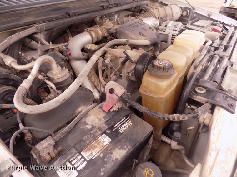 image for item DD2770 1999 Ford F350 Super Duty XLT SuperCab flatbed pickup truck