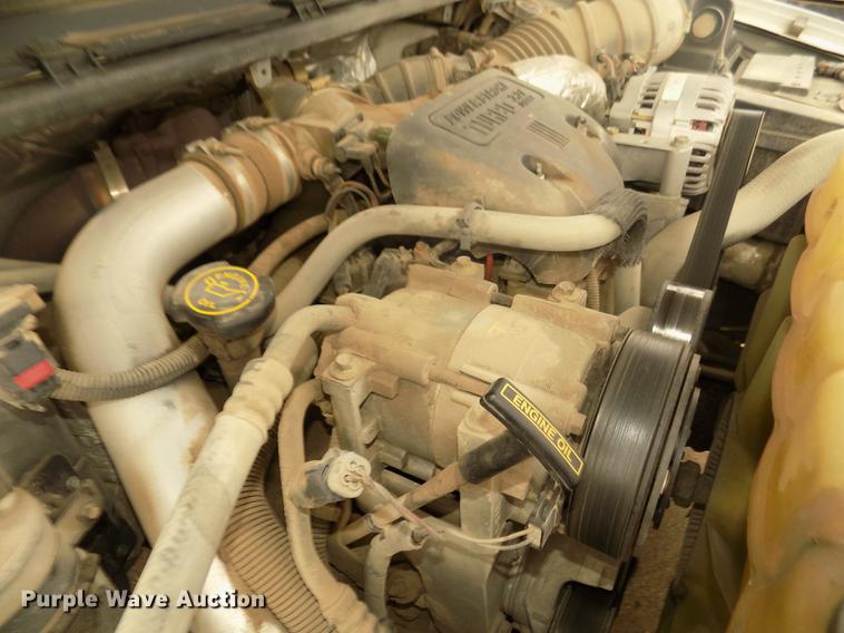 image for item DD2770 1999 Ford F350 Super Duty XLT SuperCab flatbed pickup truck