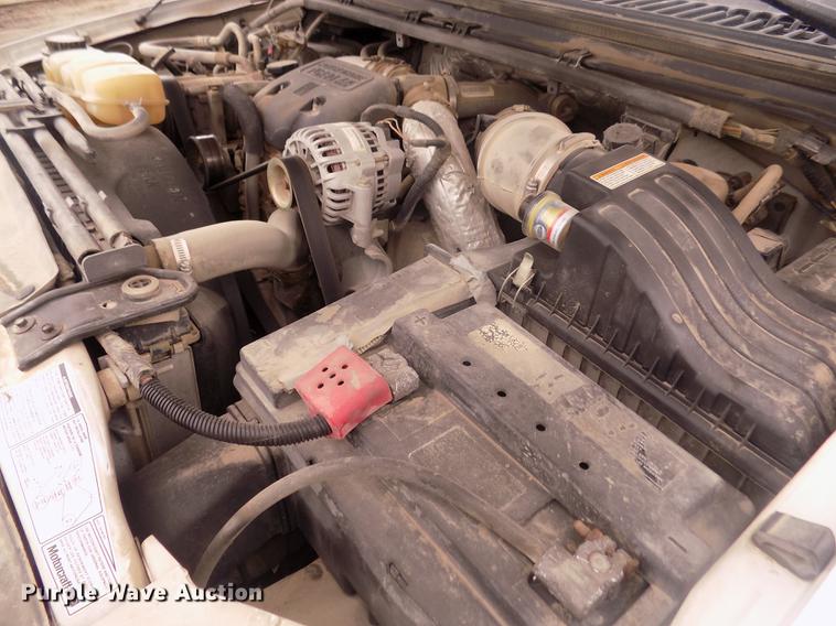 image for item DD2770 1999 Ford F350 Super Duty XLT SuperCab flatbed pickup truck