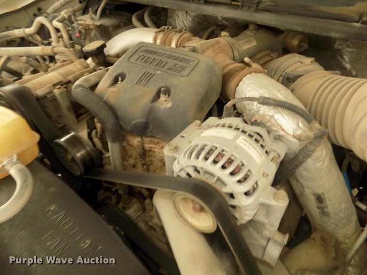 image for item DD2770 1999 Ford F350 Super Duty XLT SuperCab flatbed pickup truck