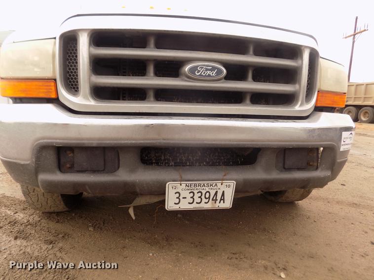 image for item DD2770 1999 Ford F350 Super Duty XLT SuperCab flatbed pickup truck