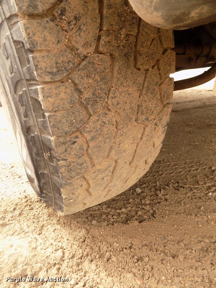 image for item DD2770 1999 Ford F350 Super Duty XLT SuperCab flatbed pickup truck