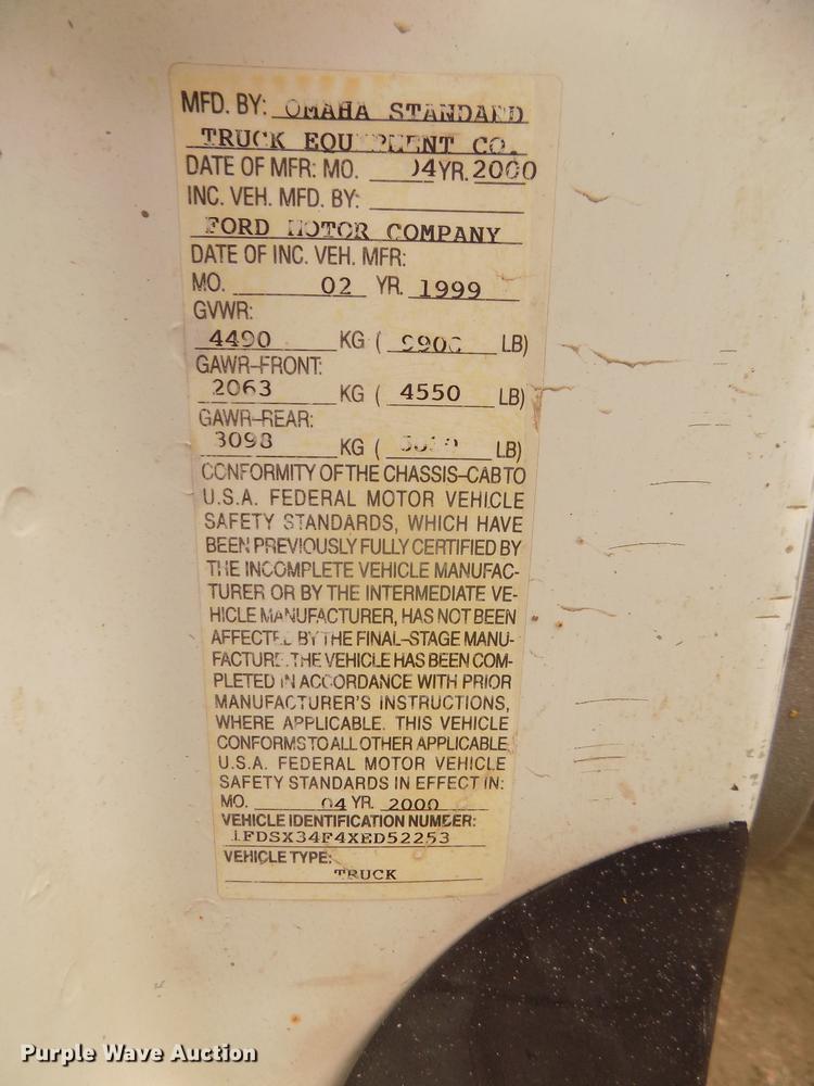 image for item DD2770 1999 Ford F350 Super Duty XLT SuperCab flatbed pickup truck