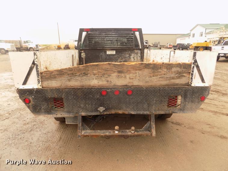 image for item DD2771 2000 Ford F350 Super Duty XLT Crew Cab flatbed pickup truck