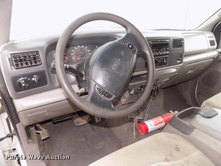 image for item DD2771 2000 Ford F350 Super Duty XLT Crew Cab flatbed pickup truck