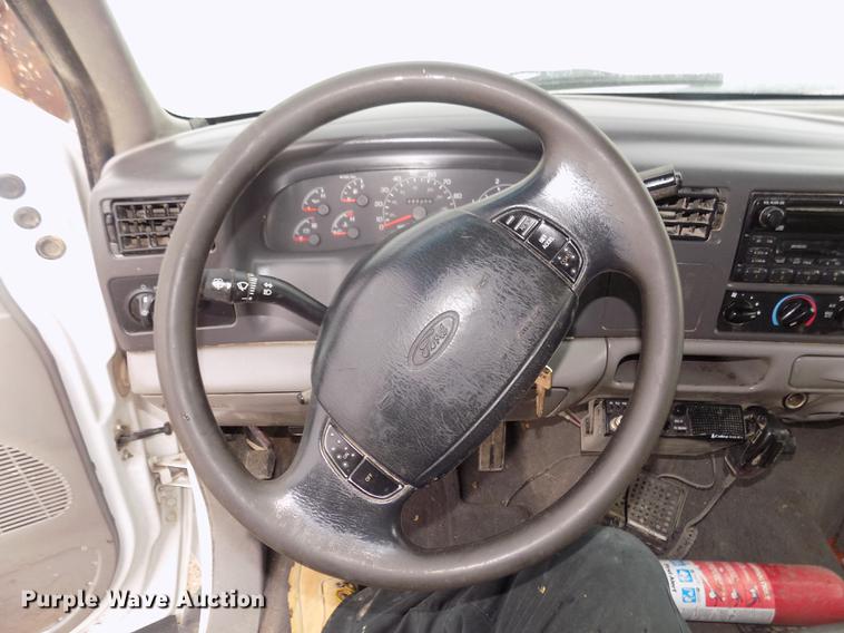 image for item DD2771 2000 Ford F350 Super Duty XLT Crew Cab flatbed pickup truck