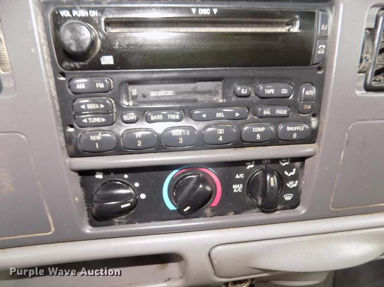 image for item DD2771 2000 Ford F350 Super Duty XLT Crew Cab flatbed pickup truck