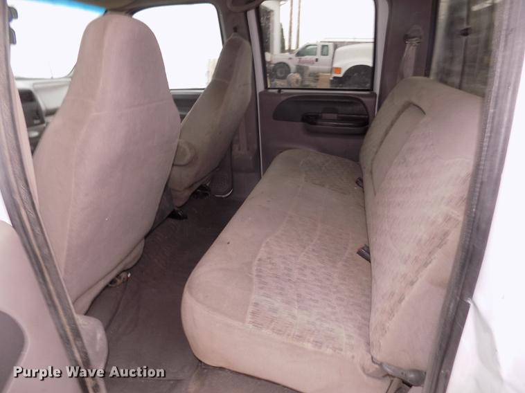 image for item DD2771 2000 Ford F350 Super Duty XLT Crew Cab flatbed pickup truck