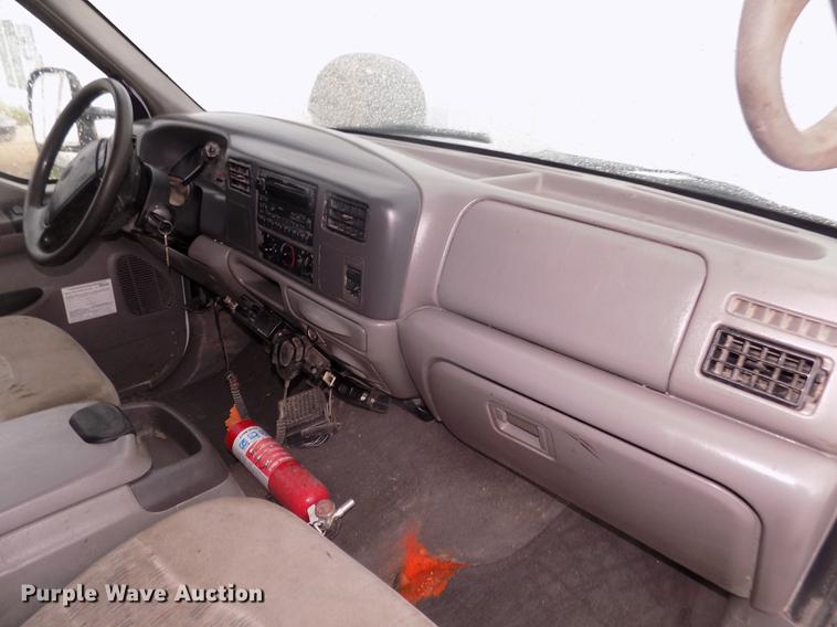 image for item DD2771 2000 Ford F350 Super Duty XLT Crew Cab flatbed pickup truck