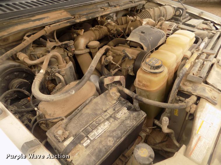 image for item DD2771 2000 Ford F350 Super Duty XLT Crew Cab flatbed pickup truck