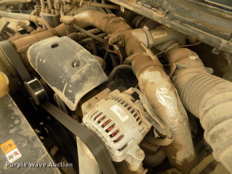 image for item DD2771 2000 Ford F350 Super Duty XLT Crew Cab flatbed pickup truck