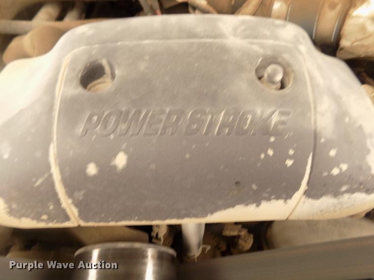 image for item DD2771 2000 Ford F350 Super Duty XLT Crew Cab flatbed pickup truck