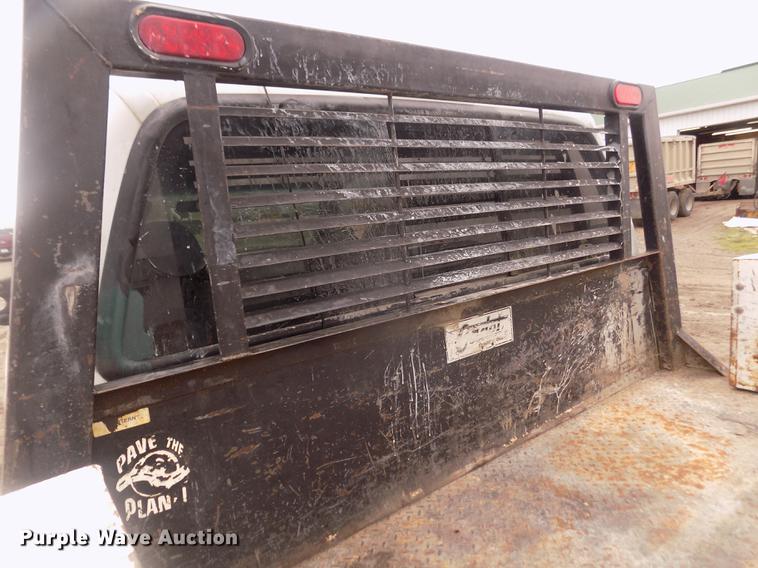 image for item DD2771 2000 Ford F350 Super Duty XLT Crew Cab flatbed pickup truck