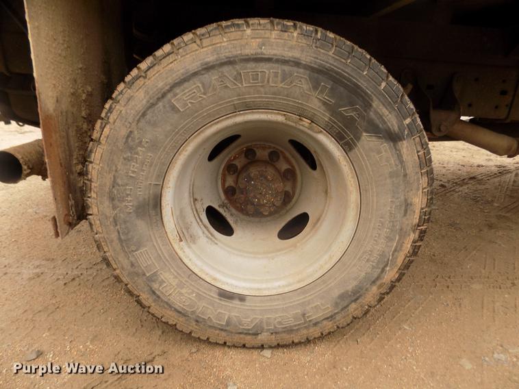 image for item DD2771 2000 Ford F350 Super Duty XLT Crew Cab flatbed pickup truck