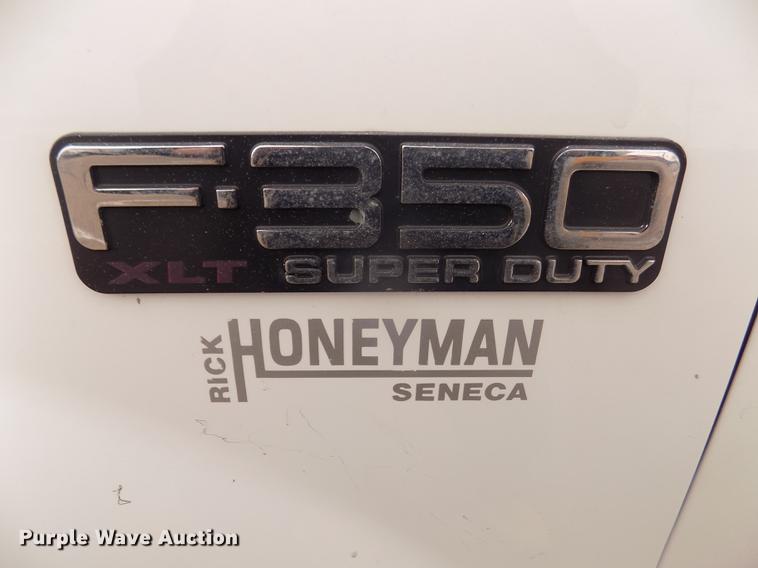 image for item DD2771 2000 Ford F350 Super Duty XLT Crew Cab flatbed pickup truck