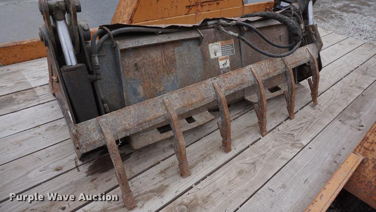 image for item DE3286 Bobcat four way skid steer bucket