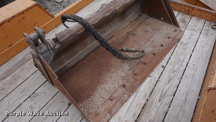 image for item DE3286 Bobcat four way skid steer bucket