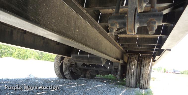 image for item J8515 2016 Overbilt Tag A Long tilt deck equipment trailer