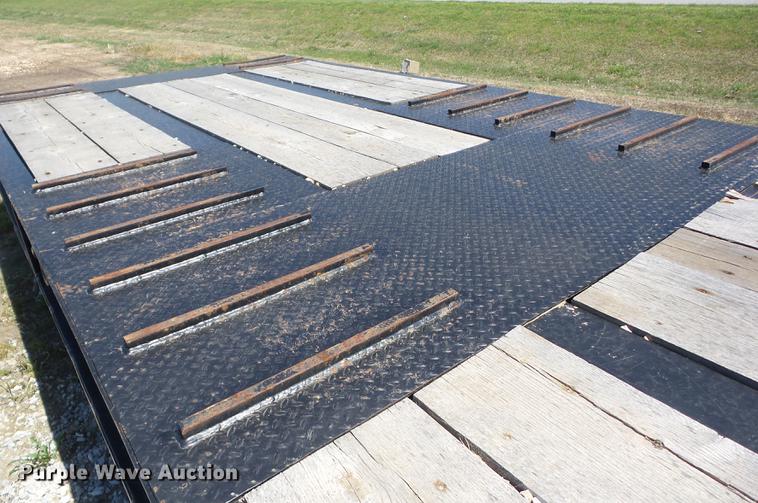 image for item J8515 2016 Overbilt Tag A Long tilt deck equipment trailer