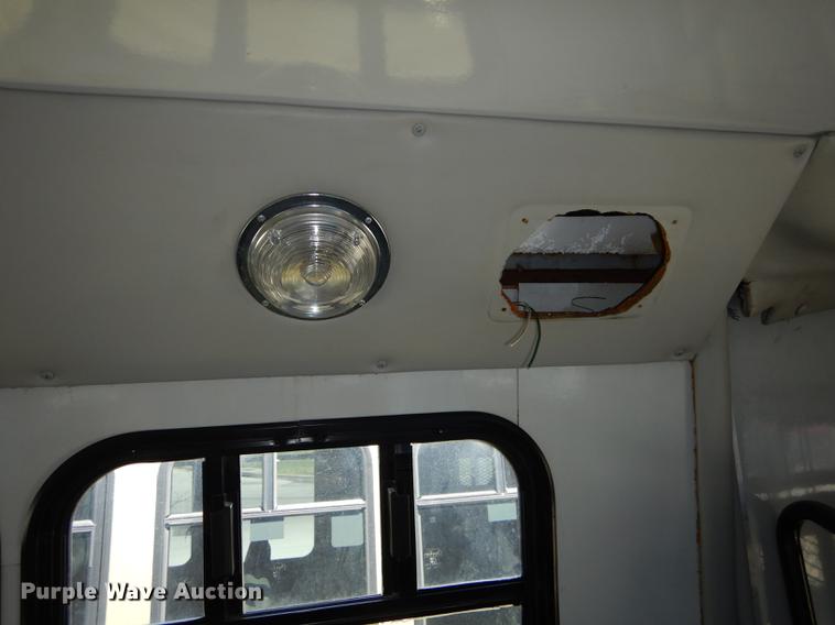 image for item DB6197 2005 Ford E450 shuttle bus