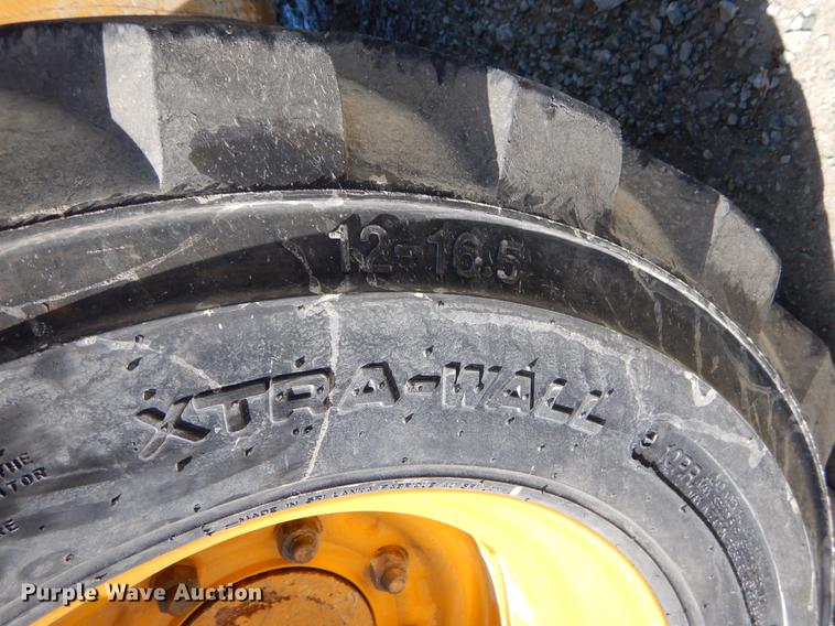 image for item EI9018 2010 John Deere 326D skid steer