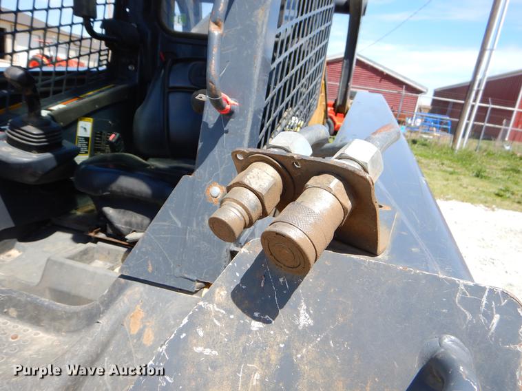 image for item EI9018 2010 John Deere 326D skid steer