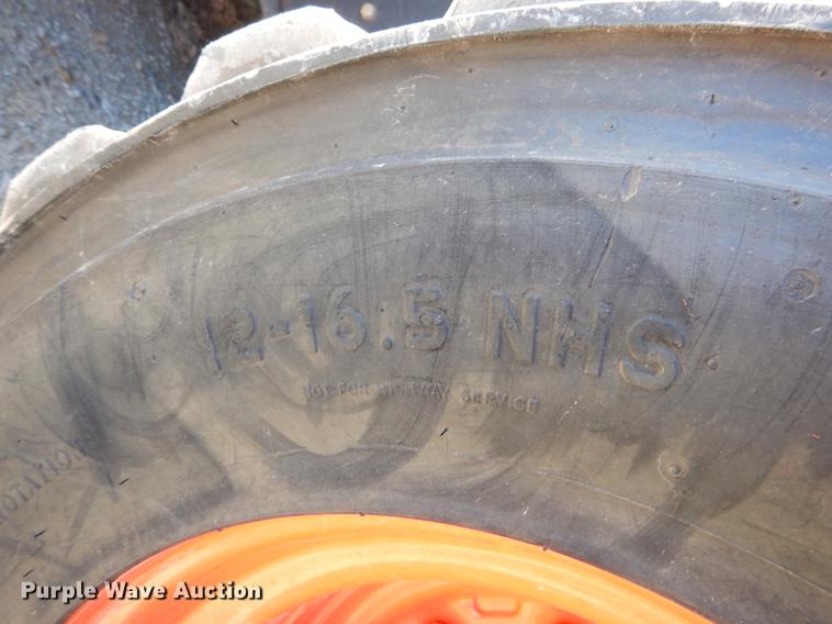 image for item EI9077 2016 Kubota SSV75 skid steer