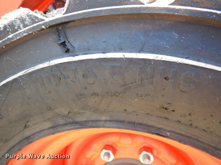 image for item EI9078 2016 Kubota SSV65 skid steer