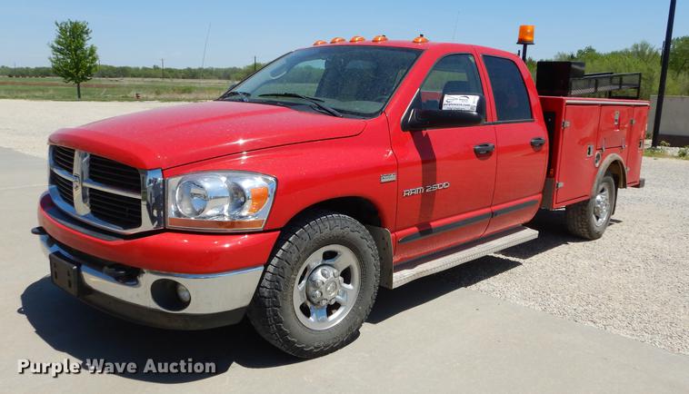 image for item DE1704 2006 Dodge Ram 2500 Quad Cab utility bed pickup truck
