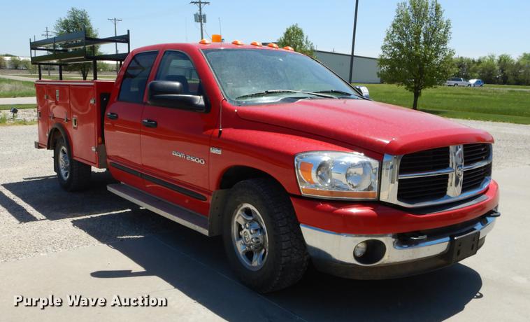 image for item DE1704 2006 Dodge Ram 2500 Quad Cab utility bed pickup truck