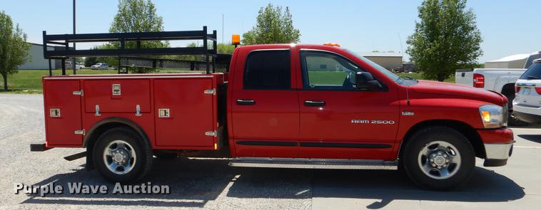 image for item DE1704 2006 Dodge Ram 2500 Quad Cab utility bed pickup truck