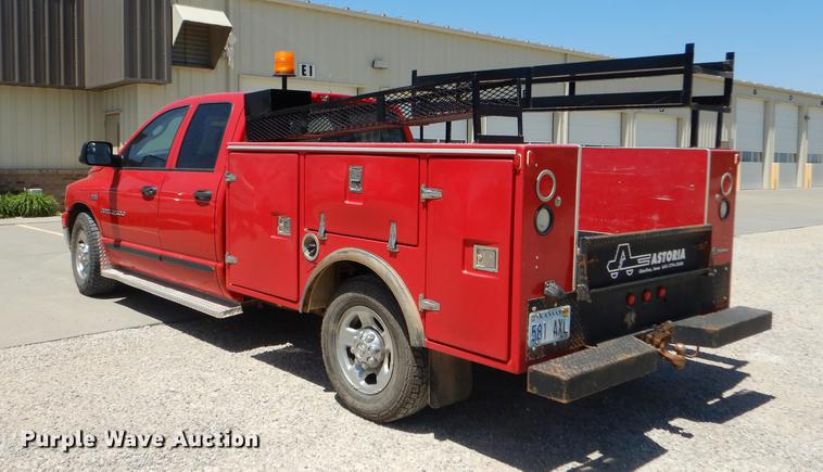 image for item DE1704 2006 Dodge Ram 2500 Quad Cab utility bed pickup truck