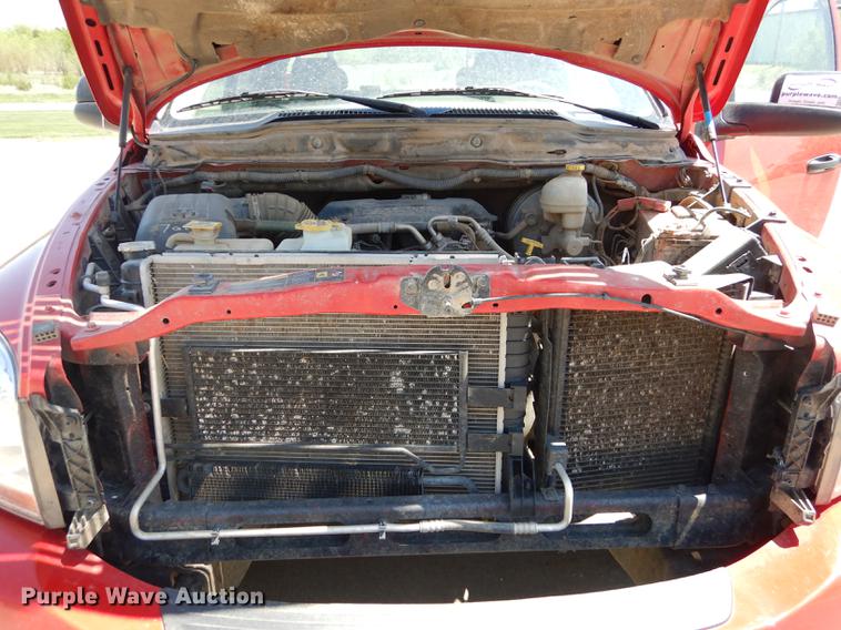 image for item DE1704 2006 Dodge Ram 2500 Quad Cab utility bed pickup truck